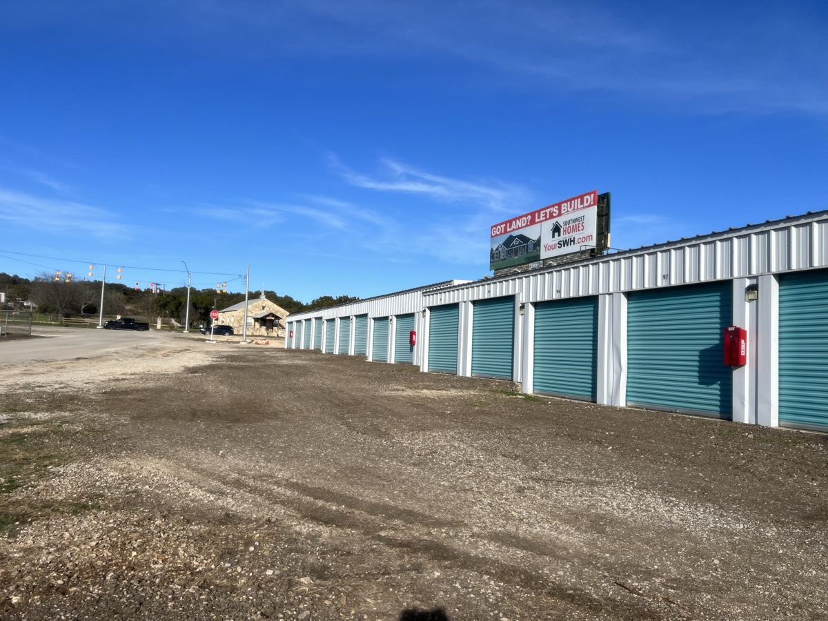 Antler Mini Storage Pipe Creek facility showing row of storage units with teal doors